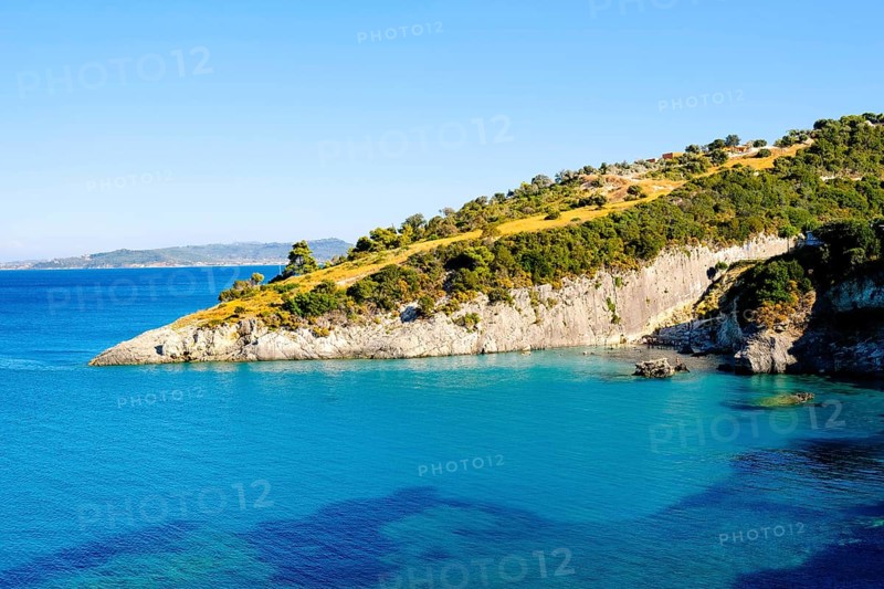 Xigia Beach, often referred to as Sulfur Beach, is a truly unique and therapeutic coastal spot on the northeastern side of Zakynthos island
