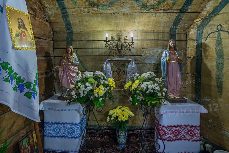 Marian Altarpiece in the historic wooden Trinity Church, Zhovkva city, Ukraine