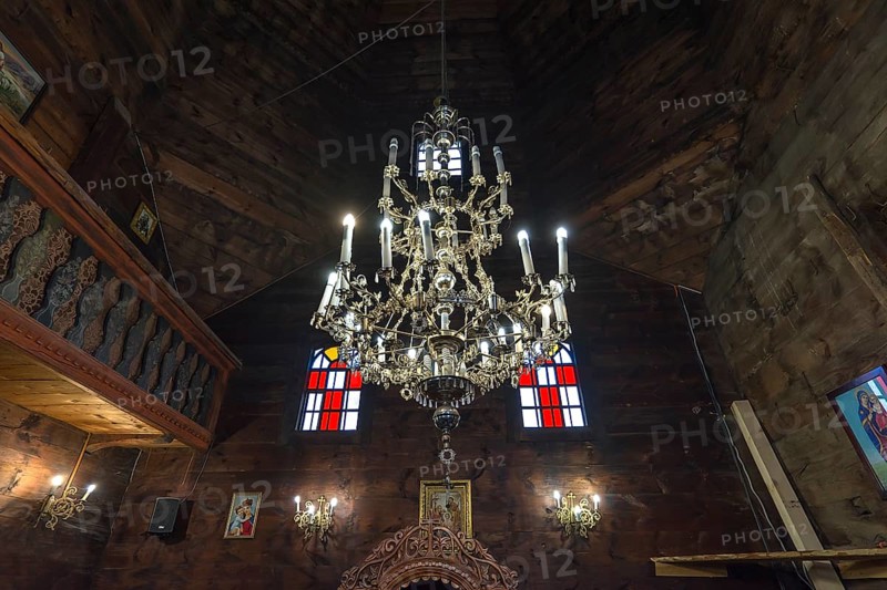 Silver candlestick in the historic wooden Trinity Church, Zhovkva city, Ukraine