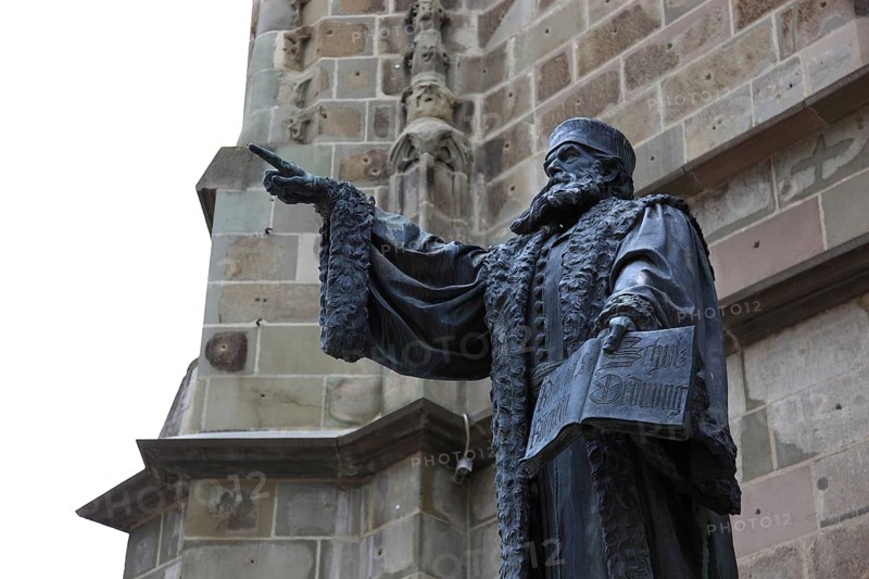 Statue of Johannes Honterus, also Johannes Honter, (born around 1498 in Kronstadt, Transylvania, died 23 January 1549), Transylvanian-Saxon humanist and polymath. As a church reformer, he played a decisive role in the introduction of the Reformation in Transylvania. He was also a schoolman, carver, paper miller and, from 1539, founder and operator of the second, but first permanent and most productive printing works in Transylvania. Statue of Harro Magnussen in front of the Black Church in Brasov, Brasov, Romania
