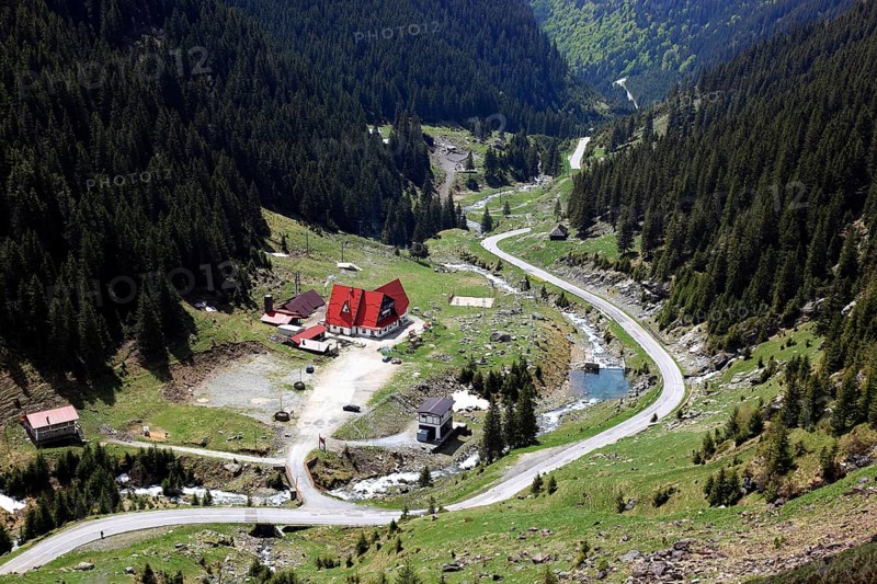 Landscape on the Transfogarasan Highway, Transfagarasan, connects the Arges Valley in Great Wallachia with the Olt Valley in Transylvania, crossing the Fagaras Mountains in the Transylvania Alps, to melt snow in May, Romania