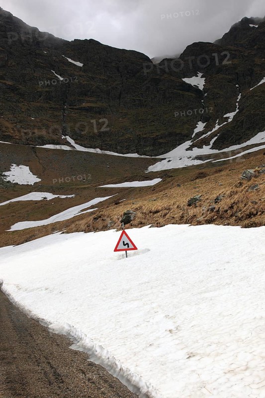 Transfogarasan Highway, Transfagarasan, connects the Arges Valley in Great Wallachia with the Olt Valley in Transylvania, crossing the Fagaras Mountains in the Transylvania Alps, to melt snow in May, Romania