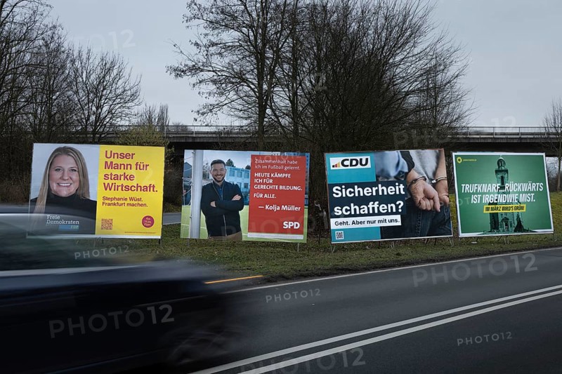 Large election posters are standing on a street in the northwest of Frankfurt. The Hessian state government has set March 15, 2026 as the election day for the local elections in Hesse. On this day, the elections of the City Council and the 16 local advisory councils will take place in Frankfurt am Main, Germany