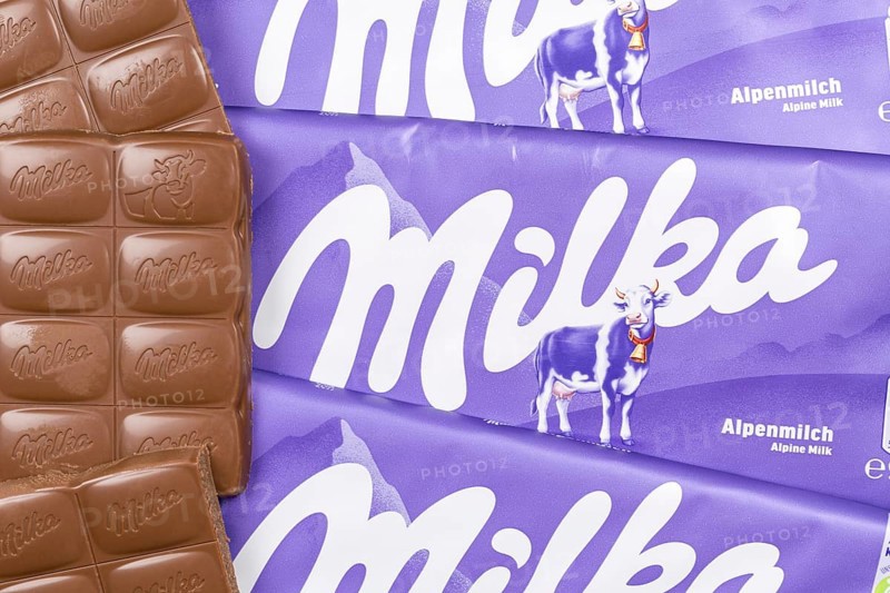 Milka chocolate bar Alpine milk chocolates with logo in Stuttgart, Germany