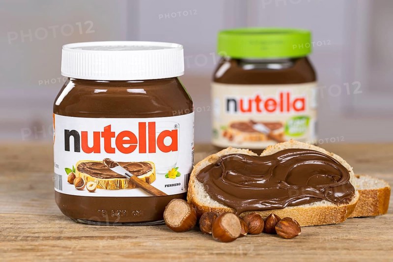 Nutella and Nutella Plant Based vegan nut nougat cream jar on bread with logo in Stuttgart, Germany
