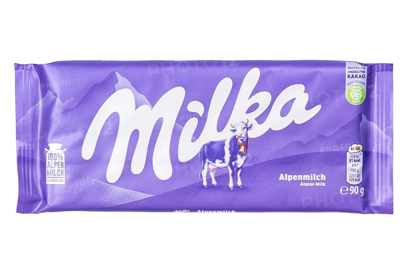 Milka chocolate 90g bar chocolate bar Alpine milk chocolates isolated against a white background with logo in Stuttgart, Germany