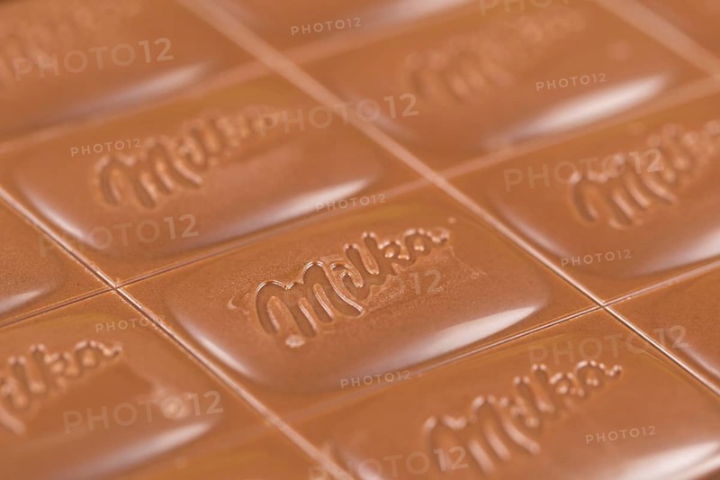 Milka chocolate bar alpine milk chocolate background with logo in Stuttgart, Germany