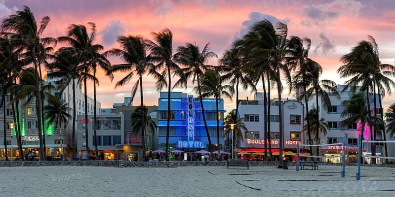 Miami Beach Florida building on Ocean Drive in art deco architecture style panorama at night in Miami Beach, USA