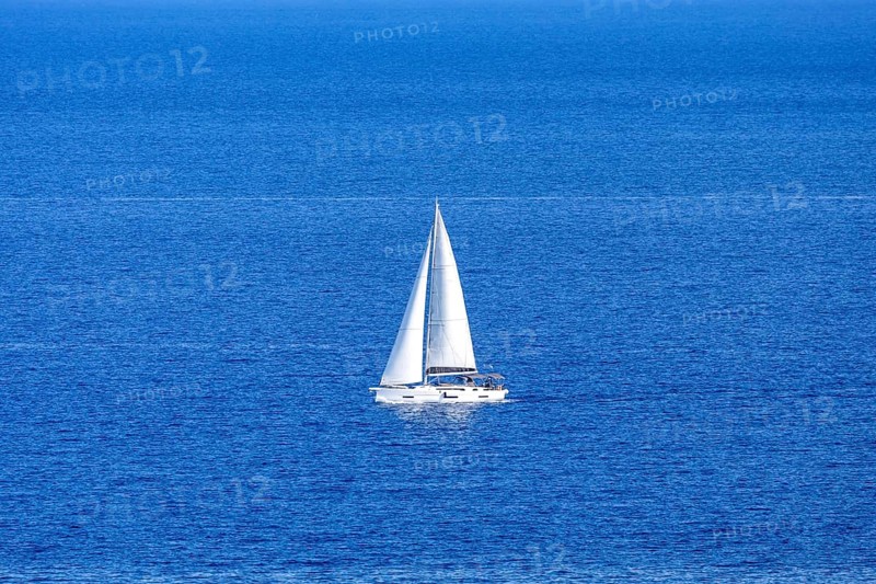 Sailing boat in the Mediterranean Aegean Sea vacation off the island of Rhodes, Greece