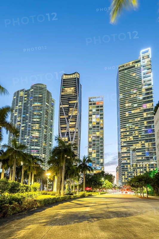 Miami skyline with high-rise real estate at night at Maurice A. Ferre Park in Miami, USA
