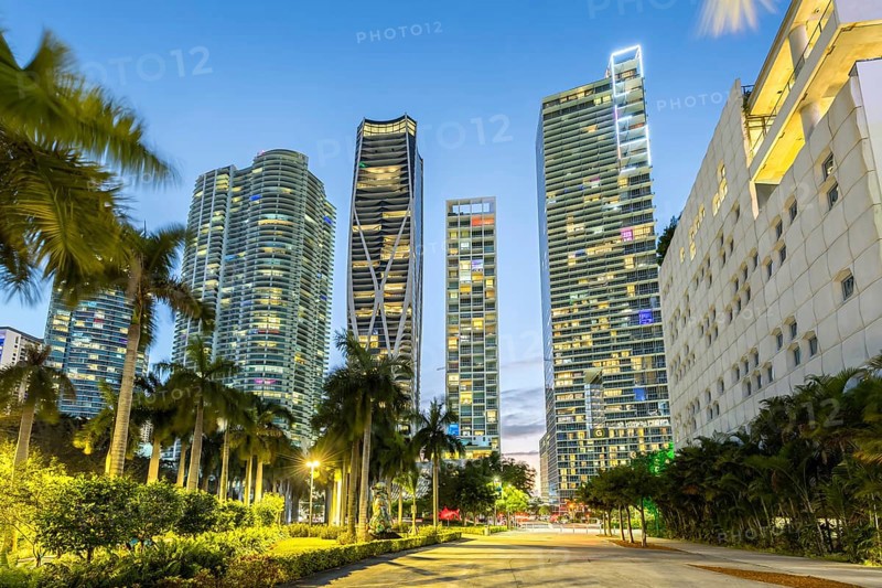 Miami skyline with high-rise real estate at night at Maurice A. Ferre Park in Miami, USA