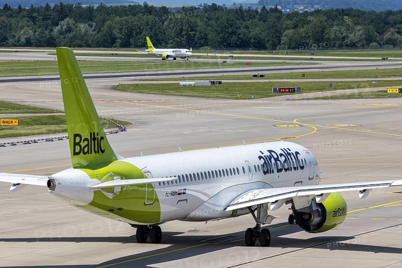An Airbus A220-300 Air Baltic aircraft with the license plate YL-ABH at Zurich Airport, Switzerland