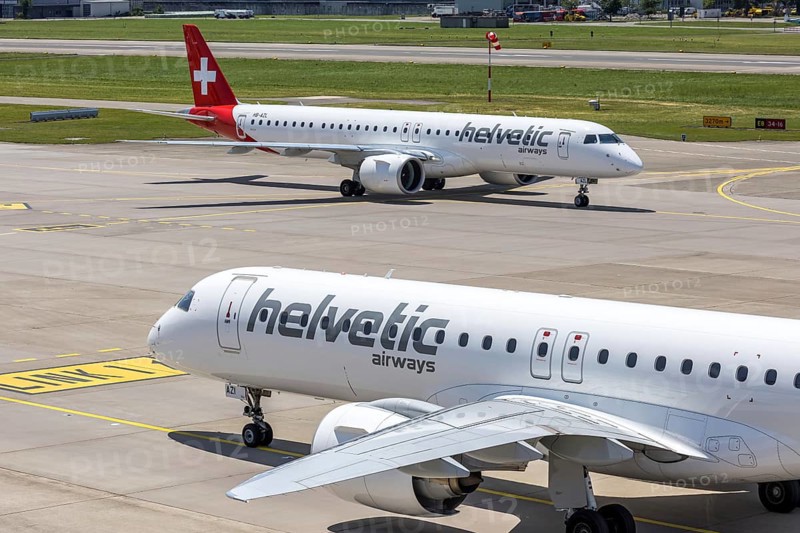 Embraer 195 E2 Helvetic Airways aircraft with the HB-AZI license plate at Zurich Airport, Switzerland