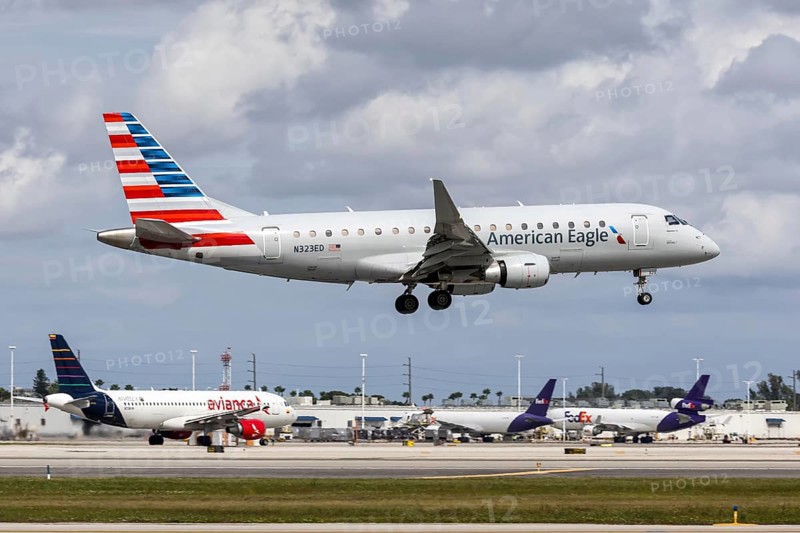 An American Eagle Envoy Air Embraer 175 aircraft with license plate N323ED at Miami airport, USA