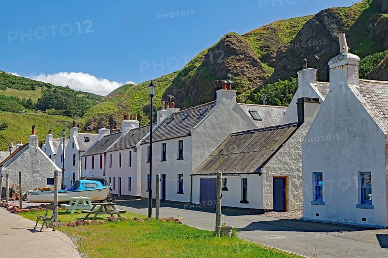 White houses at the foot of hills in a picturesque village, Local Hero, Pennan, Aberdeenshire, Scotland, United Kingdom