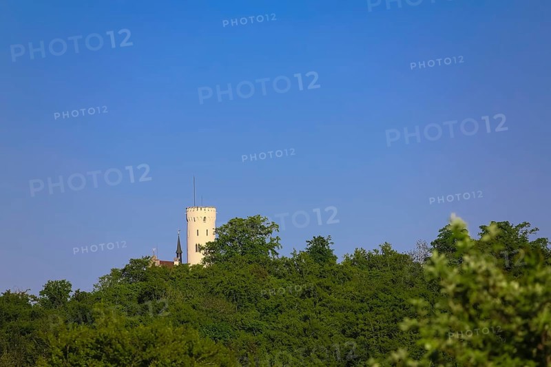 Lime kiln near the fog cave, Lichtenstein Castle tower, Württemberg fairytale castle, romantic fairytale castle on the eaves of the Swabian Jura, bushes, hills, landscape, Swabian Jura, municipality of Lichtenstein, district of Reutlingen, Baden-Württemberg
