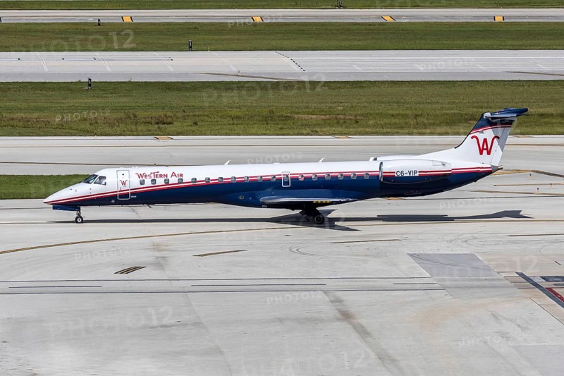 A Western Air Embraer 145 aircraft with the license plate C6-VIP at Fort Lauderdale airport, USA