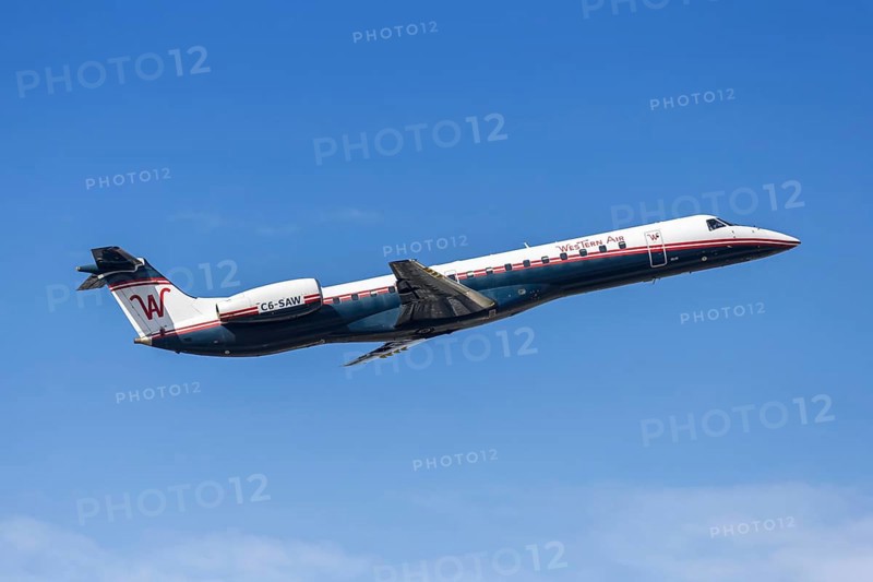 A Western Air Embraer 145 aircraft with the license plate C6-SAW at Fort Lauderdale airport, USA
