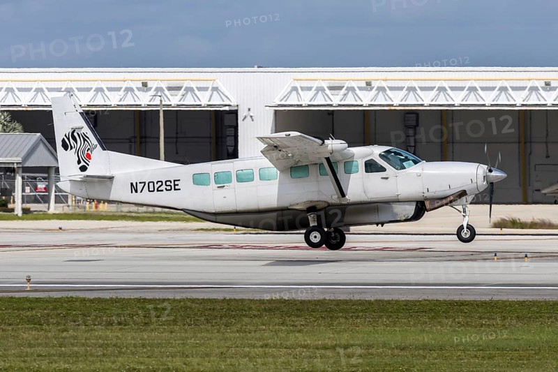 A Florida Air Cargo Cessna 208B Grand Caravan aircraft with license plate N702SE at Fort Lauderdale airport, USA