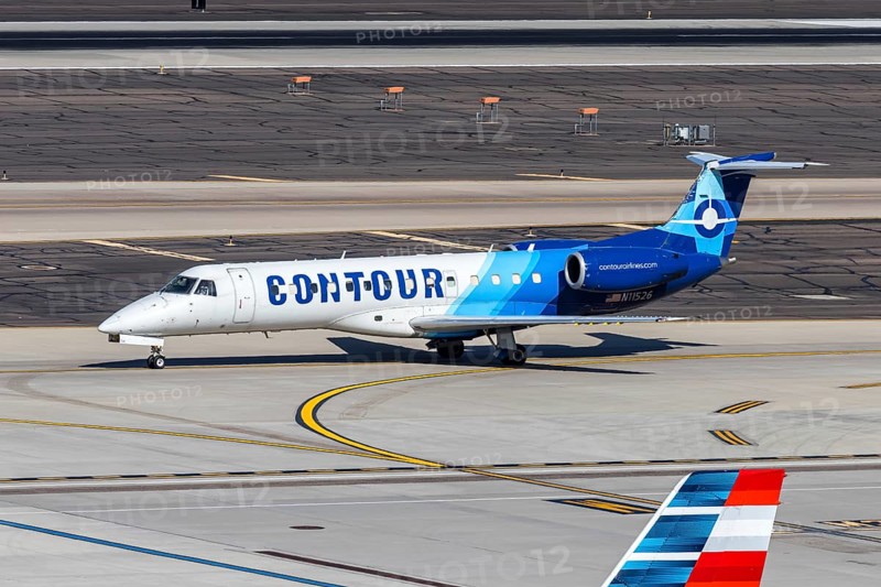 A Contour Airlines Embraer 135 aircraft with license plate N11526 at Phoenix airport, USA