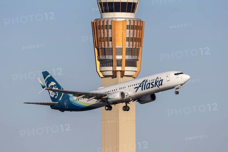 An Alaska Airlines Boeing 737-900ER aircraft with license plate N274AK at Phoenix airport, United States