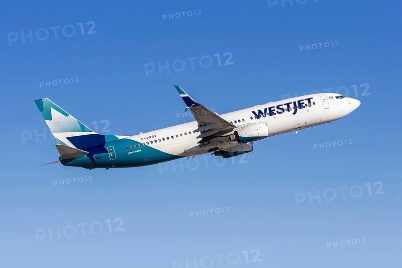 A Westjet Airlines Boeing 737-800 aircraft with the license plate C-GWSV at Phoenix airport, USA