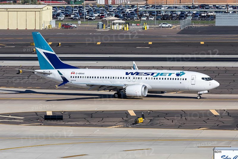 A Westjet Airlines Boeing 737-8 MAX aircraft with the license plate C-GRAX at Phoenix airport, USA