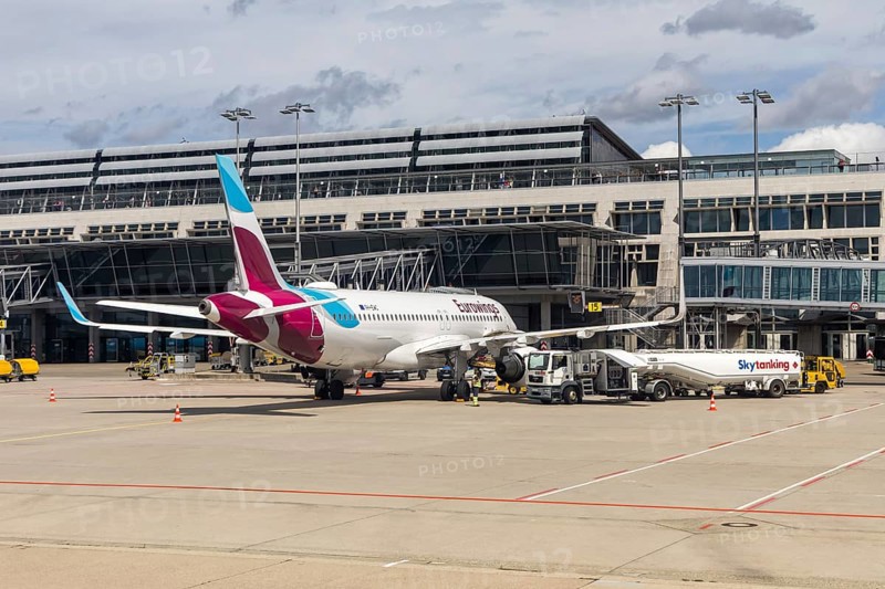 A Eurowings Europe Airbus A320 aircraft with the license plate 9H-EWC at the airport in Stuttgart, Germany