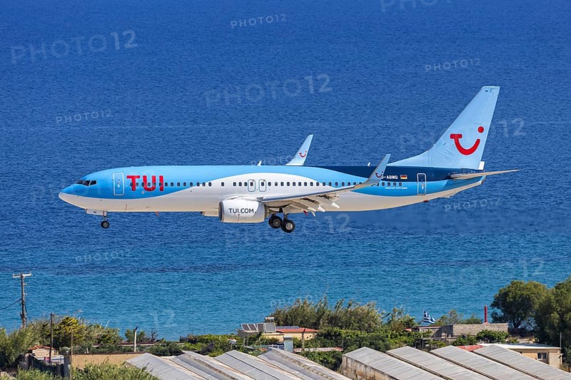 A TUI Boeing 737-800 aircraft with license plate D-ABMQ at Rhodes airport, Greece