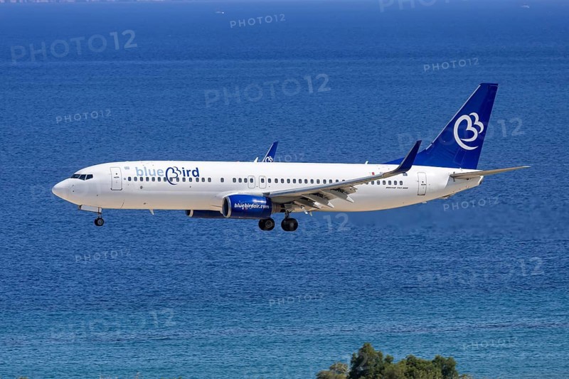 A Bluebird Airways Boeing 737-800 aircraft with the license plate 9H-KAR at Rhodes airport, Greece