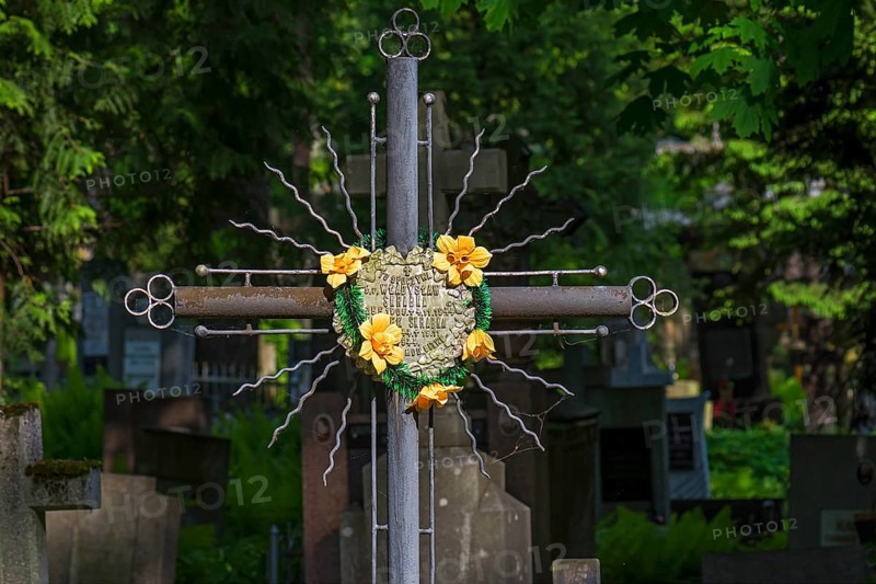 Artificial flower mix on a cross, Lützenhofer cemetery Lychakivsky cemetery, Lviv, Galicia, Ukraine