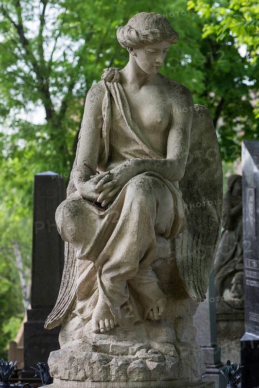 Female sculpture, hands folded, Lützenhofer cemetery Lychakivsky cemetery, Lviv, Galicia, Ukraine