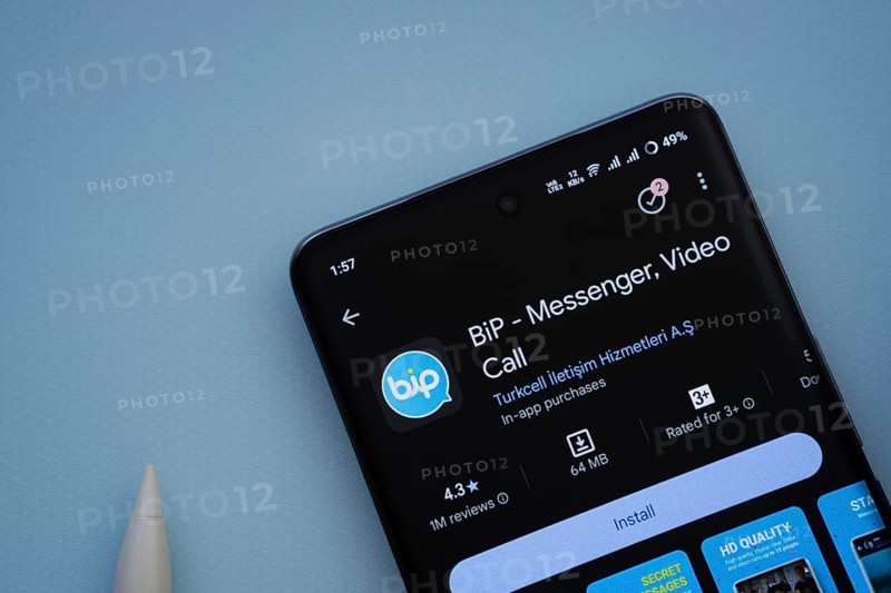 Dhaka, Bangladesh- 29 May 2025: On a blue surface, a smartphone displays the Bip app within the Google Play Store