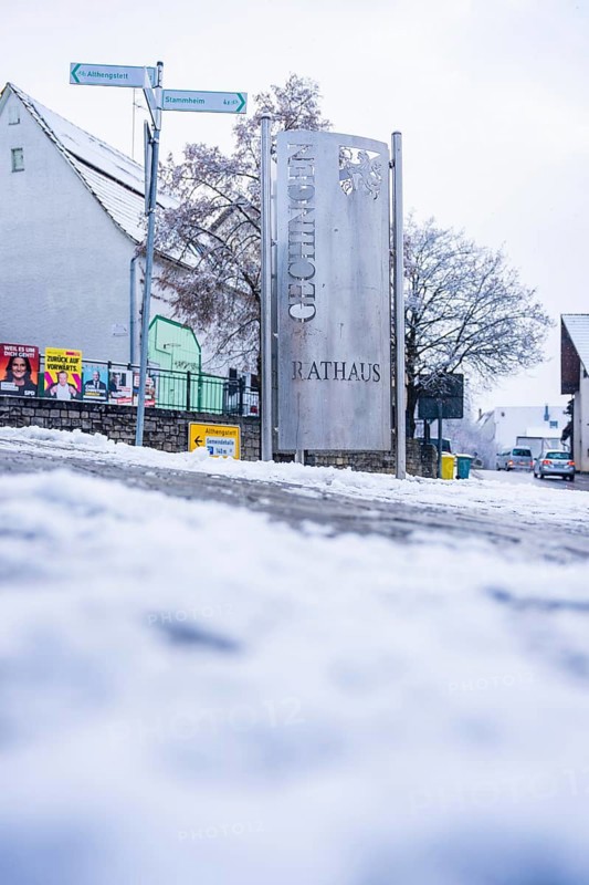 Municipal sign with the inscription 'Town Hall' in a snowy area, Gechingen, Calw district, Germany