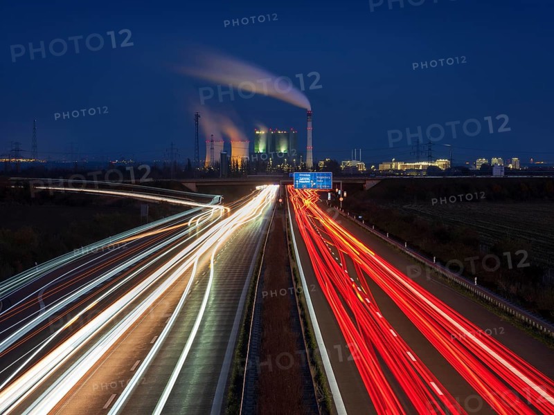 Night shot, long exposure, light trails on the A38 motorway, Schkopau power plant in the back, Saxony-Anhalt, Germany