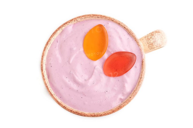 Purple Yogurt, with jelly candy isolated on white background, top view, flat lay, close up, minimalism