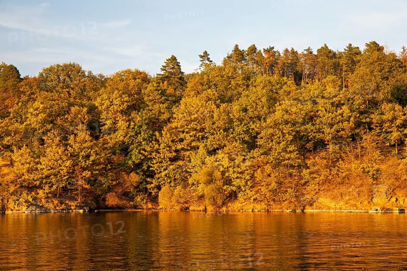 Brno Reservoir (Brnenská prehrada) on the Svratka River on a sunny autumn day. The reservoir is located northwest of the city of Brno in the Czech Republic