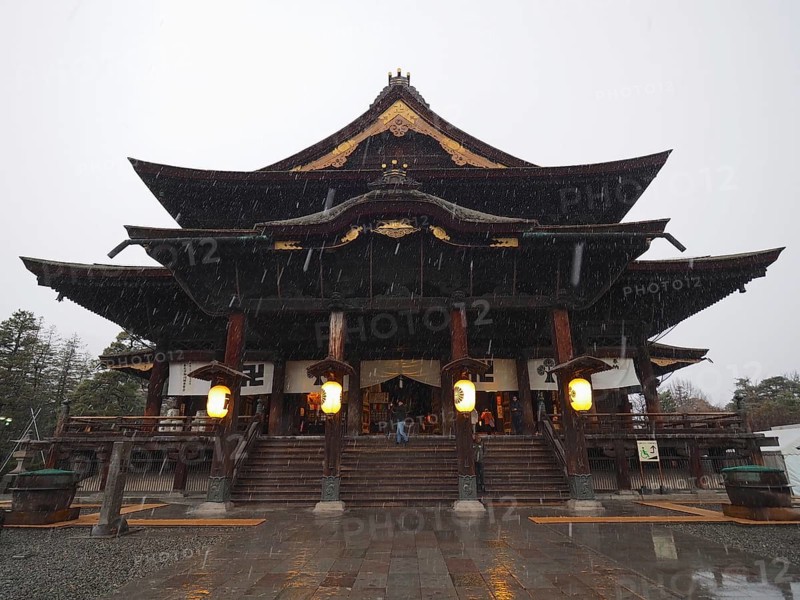 Japanese temple in rain giving off a calm atmosphere, Zenko-ji Temple, Nagano, Japan