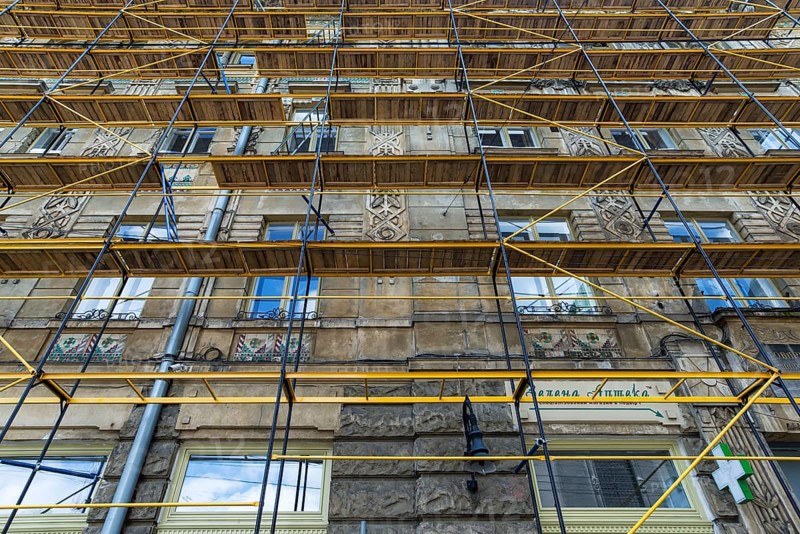 Scaffolding on a residential building, 19th century, for façade restoration, Lemberg, Ukraine