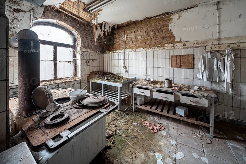 Dilapidated kitchen full of rubble in an abandoned country inn, Lost Place, Saxony-Anhalt, Germany