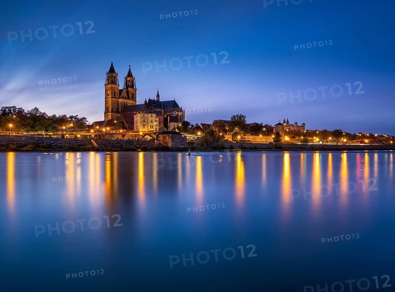 City view with Magdeburg Cathedral on the river Elbe at dusk, Magdeburg, Saxony-Anhalt, Germany