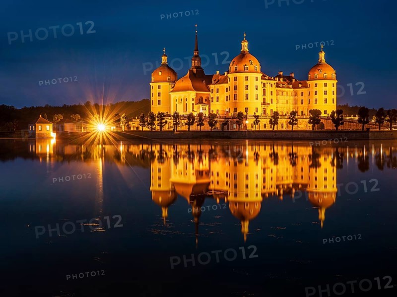 Moritzburg Castle, Augusts the Strong hunting lodge at dusk, water reflection in the lake, Saxony, Germany