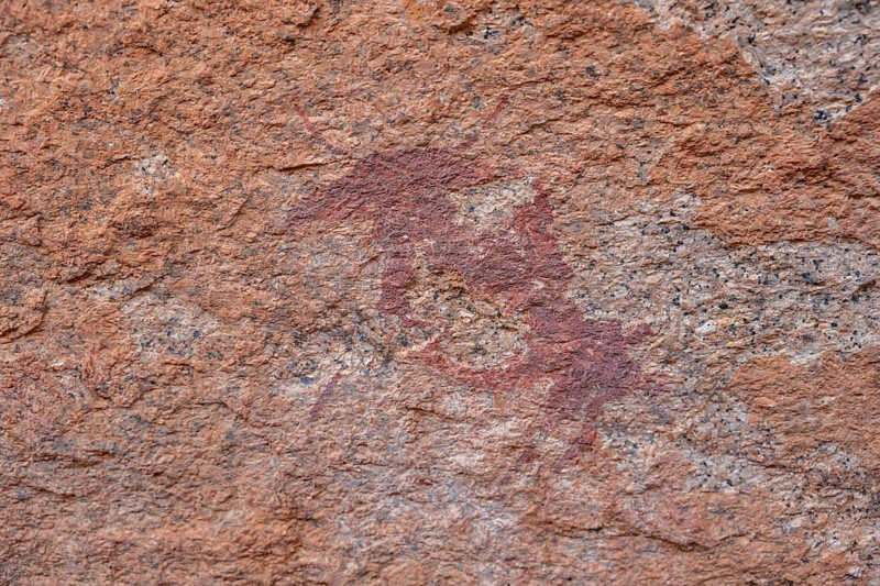Bushman's paradise, prehistoric rock carving on orange rock, Spitzkoppe, Namibia