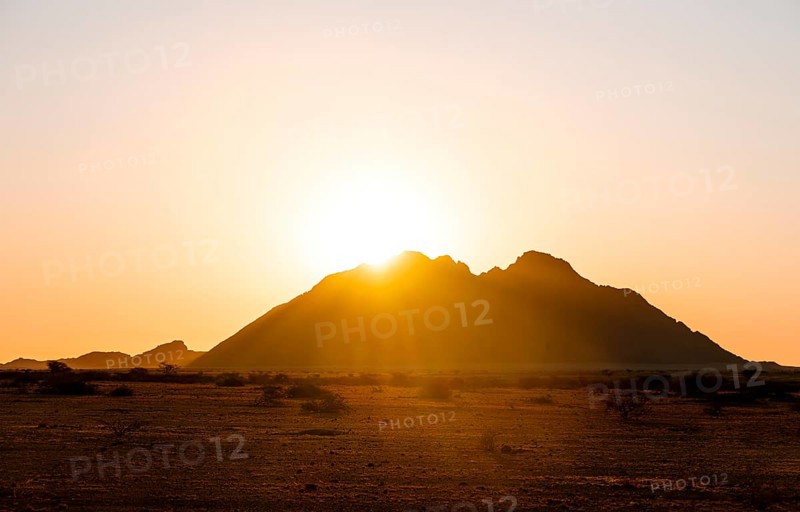 Spitzkoppe silhouette at sunset, orange sky, Spitzkoppe, Namibia