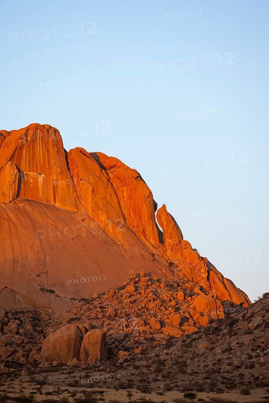 Majestic glowing red rocks in the desert of Spitzkoppe at dusk, Spitzkoppe, Namibia