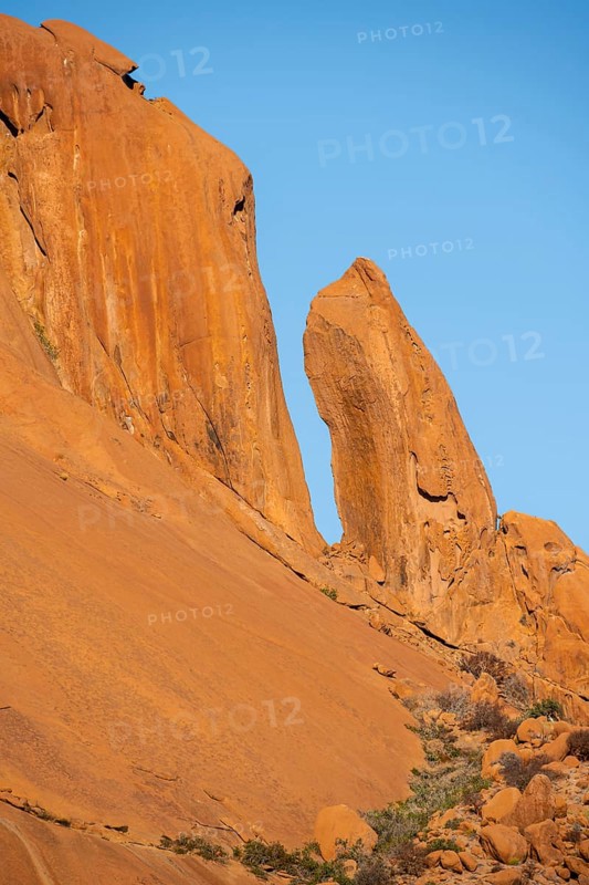Tall orange rock formations rise majestically, Spitzkoppe, Namibia
