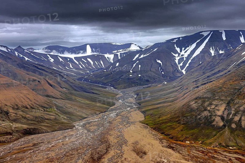 Aerial view over Adventdalen in summer, 30-kilometre valley and river Adventdalselva on the island Spitsbergen in Svalbard, Norway