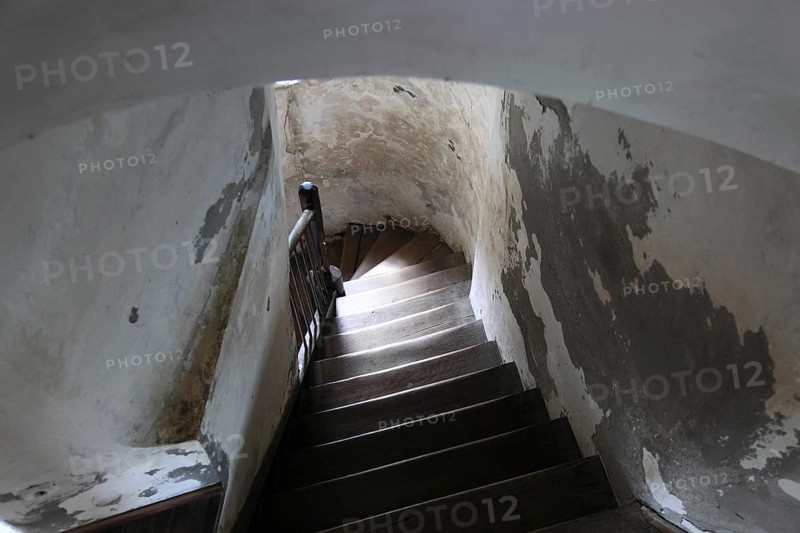 The picture shows the interior of the Chindia Tower, the staircase shown leads through the historic masonry of the tower, Turnul Chindiei, in Targoviste, Romania