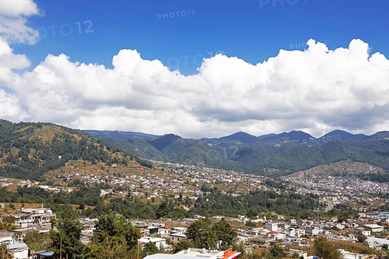 City view of Nahualá between green mountains, Highlands, Sololá Department, Guatemala