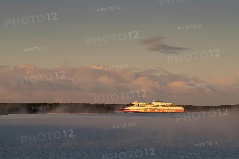 Large Viking Line ferry on calm sea at sunrise, Korpoström, Korpo or Korppo, southwestern archipelago, Finland